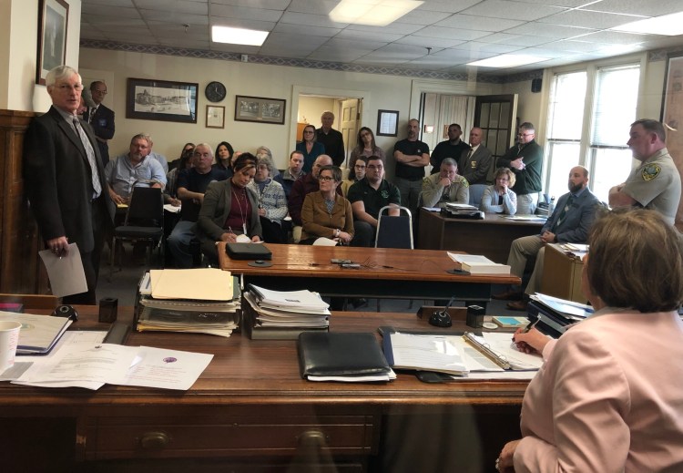 Cliff Wells, left, director of Emergency Communications for the state Department of Public Safety, talks about dispatching services for Kennebec County and a number of its municipalities Tuesday at a meeting of the Kennebec County commissioners. The Kennebec County Sheriff’s Office, the city of Gardiner and 21 towns are now trying to secure law enforcement dispatching services after the Regional Communications Center said it could no longer serve them. 