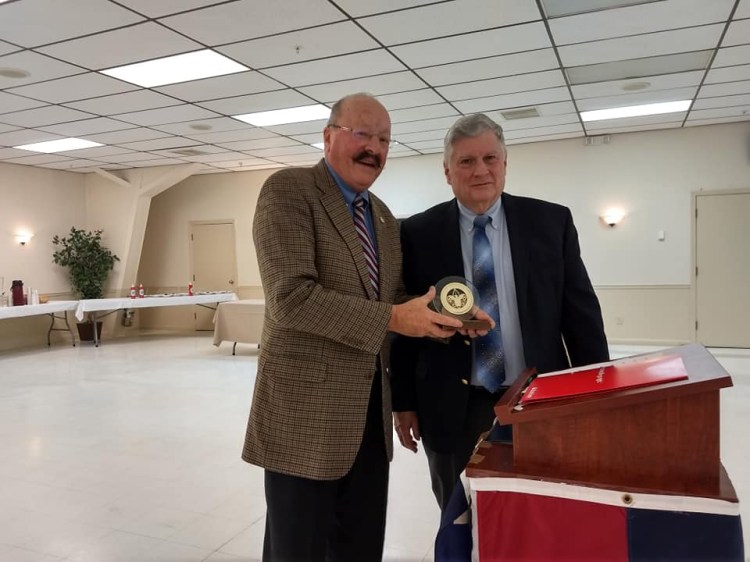 John Fortier, left, was presented the Scout Citizen Award March 7 by Eagle Scout John Dalton.