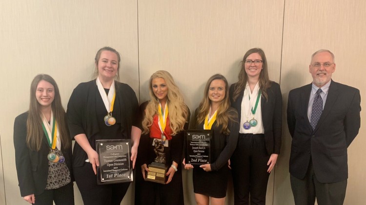 The Thomas College team from left are Kerri Abbott, Kaitlyn Rourke, Amanda Landry, Alyssa Joubert and Emma Dimock, with Dr. Rick Saucier, Thomas College professor of marketing.