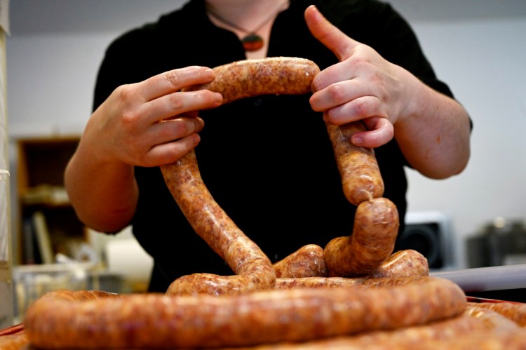 SOUTH PORTLAND, ME - OCTOBER 13: Alex Chilton, Butcher Manager at Solo Cucina Market in South Portland forming the sausage Wednesday, October 13, 2021. (Shawn Patrick Ouellette/Staff Photographer)