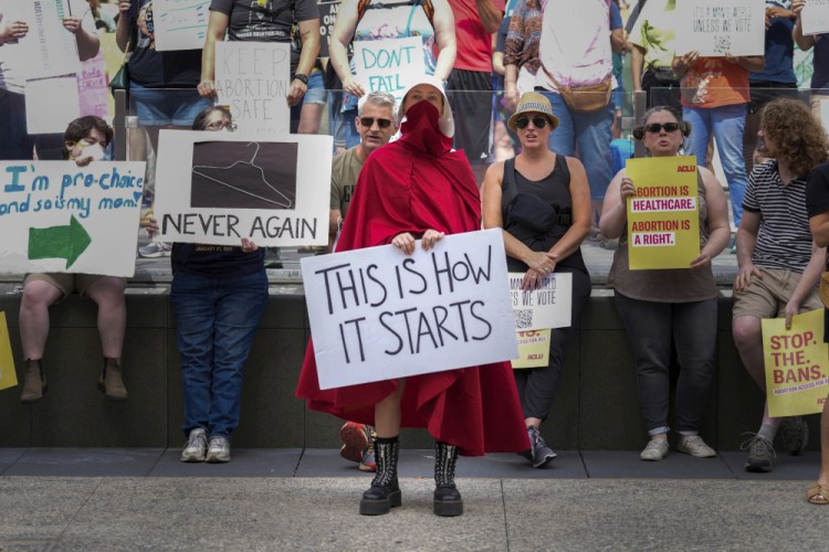 Abortion-rights activists rally at the Indiana Statehouse in Indianapolis following the Supreme Court's decision to overturn Roe v. Wade on June 25. 